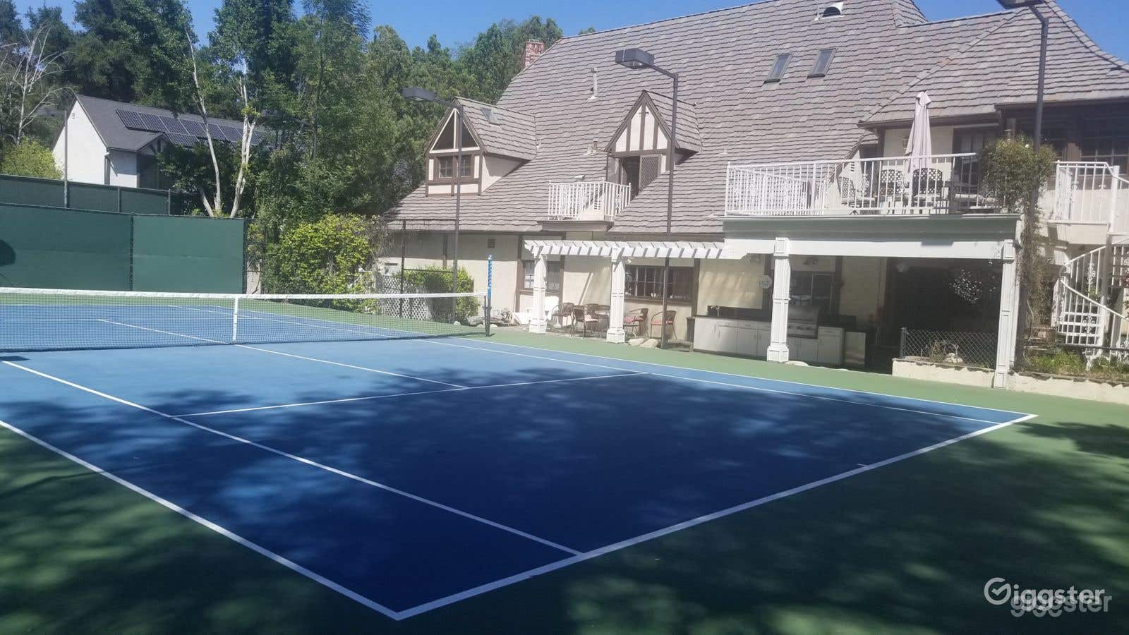 Regulation-sized Tennis court Photo 1
