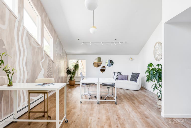  Side gallery with sloped ceiling and transitional furniture. Can be cleared for meetings or photoshoots. 