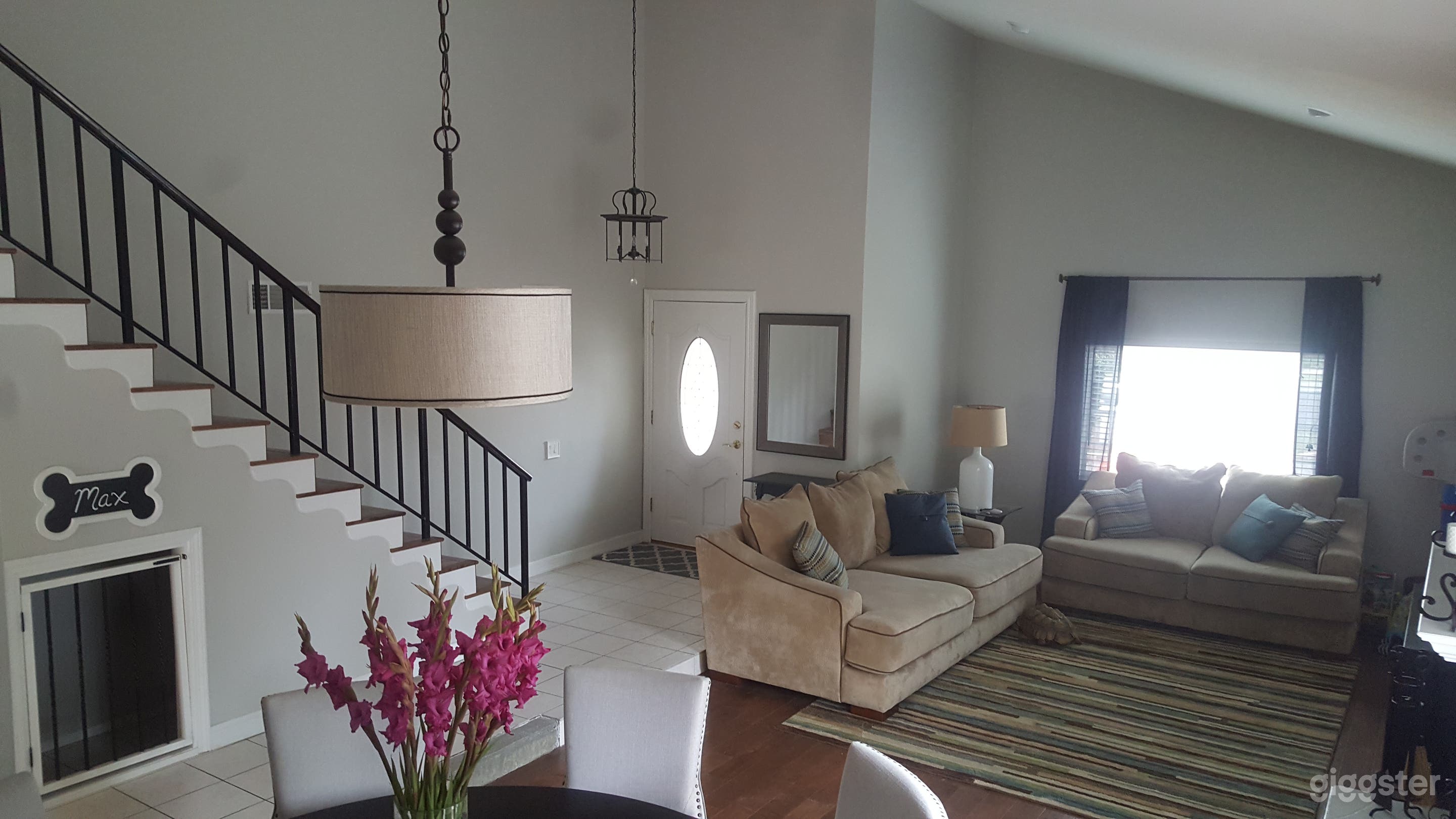 Living room. View from dining area looking toward front door.