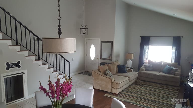  Living room. View from dining area looking toward front door. 