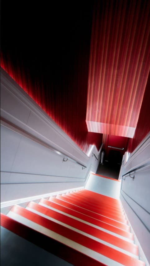 Hallway leading up to the second floor private space.