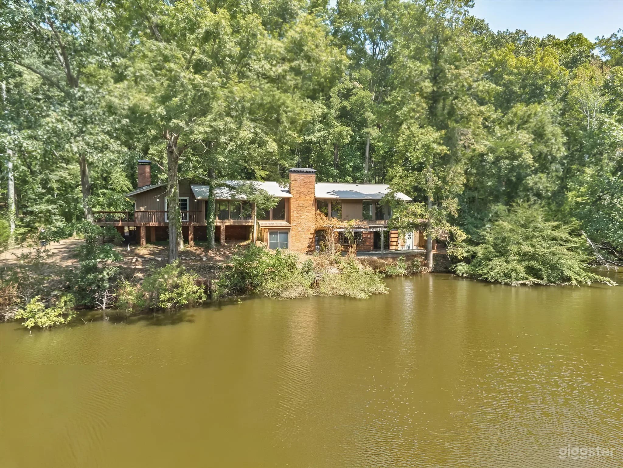 Mid-Century Lakefront Haven on 21 Private Acres Photo 1
