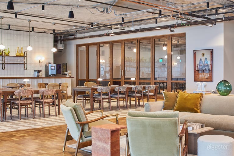  Versatile Private Event Space with Glass Partition in Modern Coworking Building Doors 