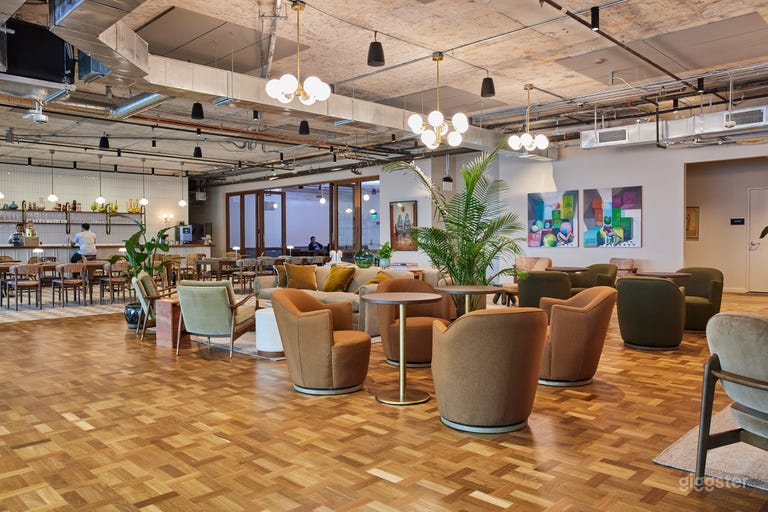  Versatile Private Event Space with Glass Partition in Modern Coworking Building Doors 