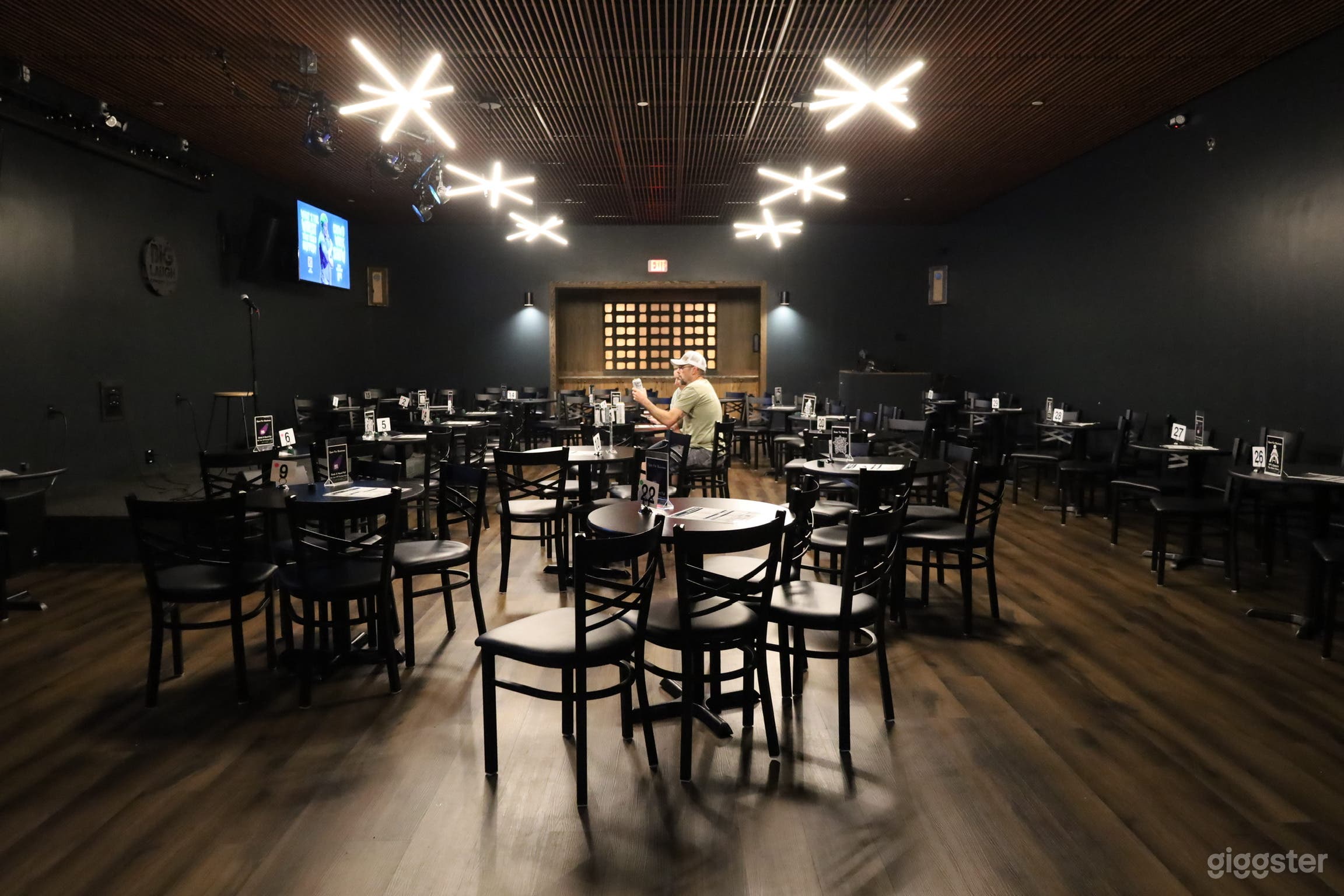 The small room downstairs that seats 100 people. 