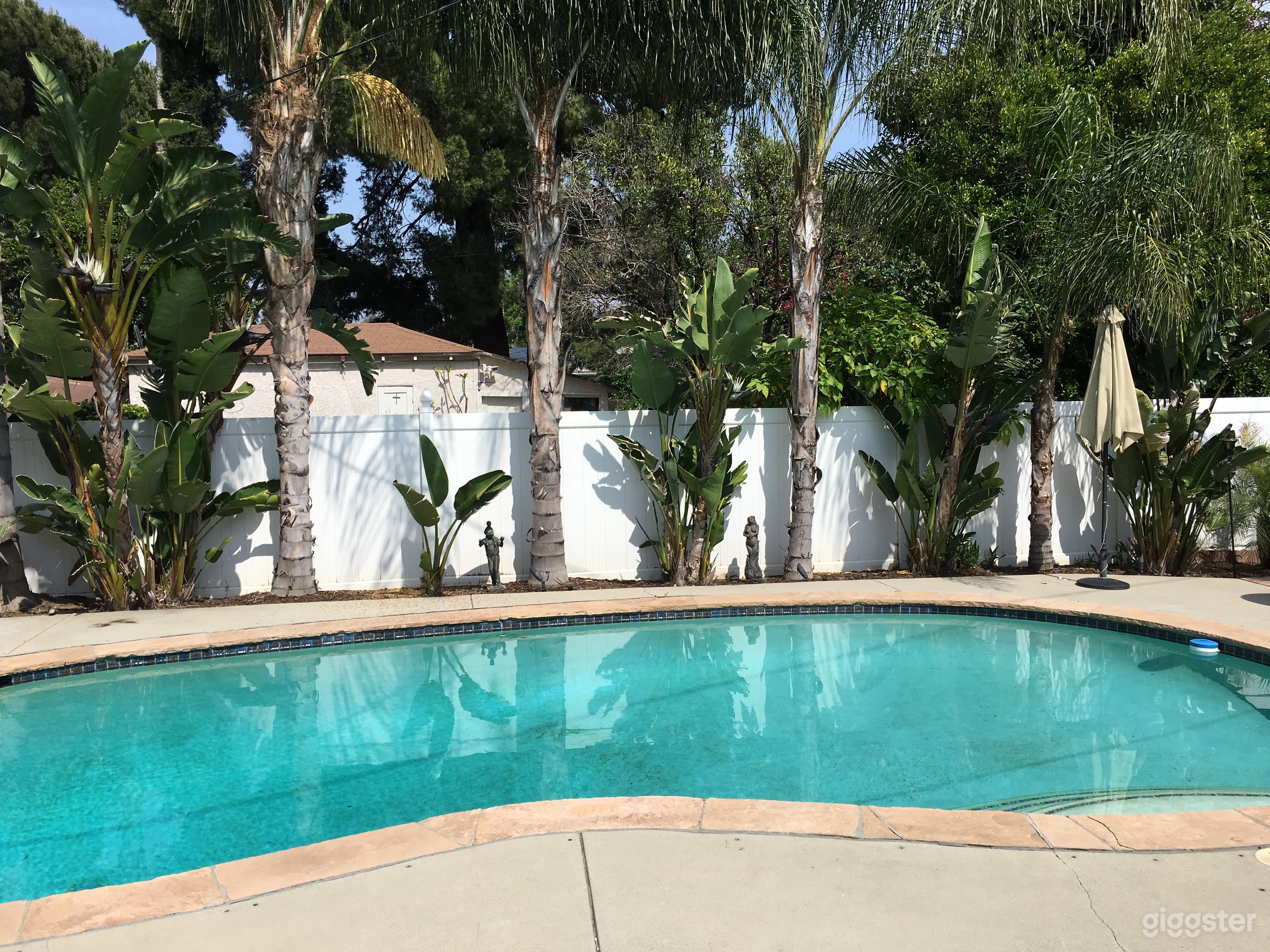 Spacious backyard with sparking pool