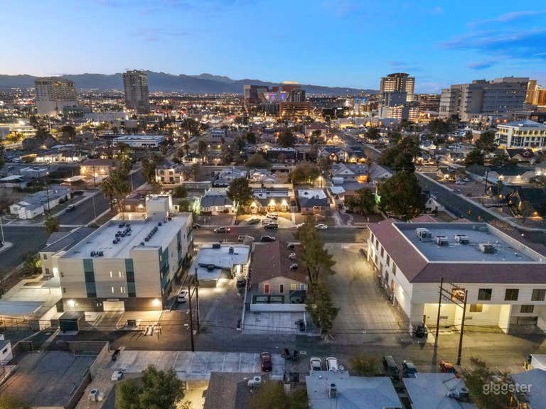  Aerial view of the rear of the property showing alley, surrounding neighborhood and Downtown Las Vegas. 