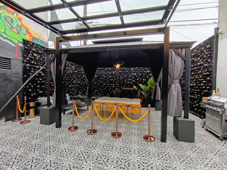  Outdoor patio with covered roof 