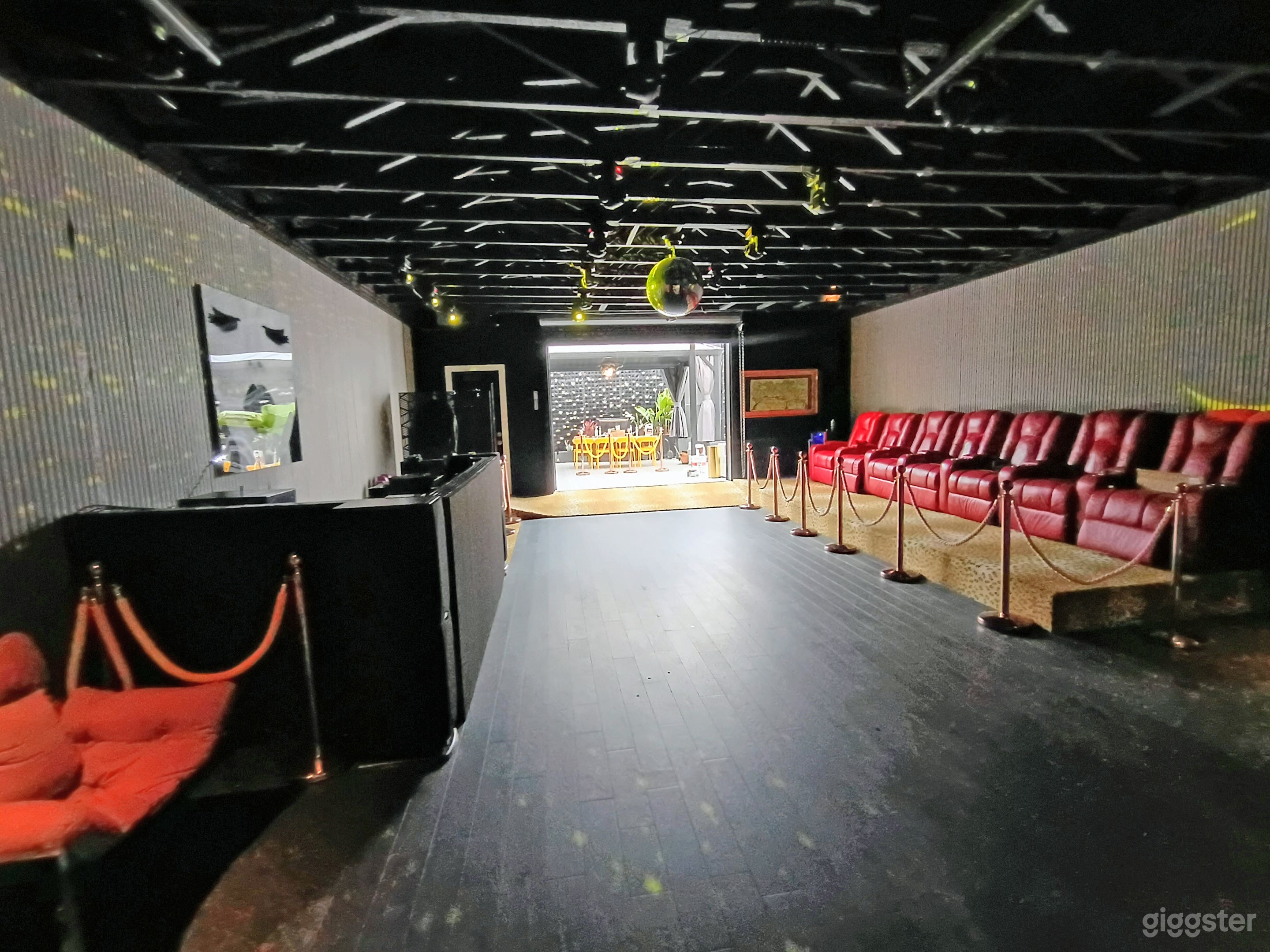 Large open floor with elevated vip area.