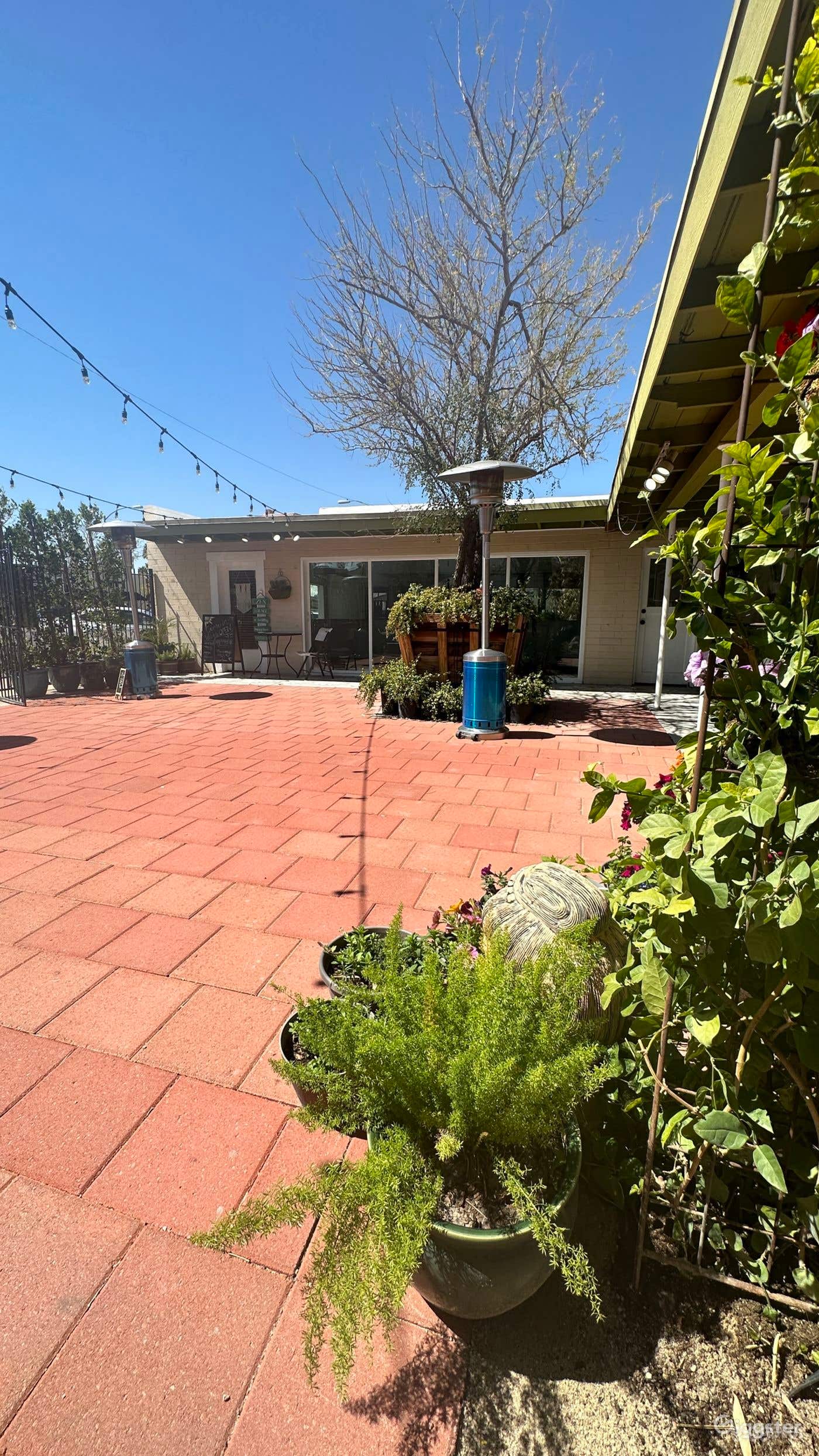 Open-Air Rustic Courtyard Photo 1