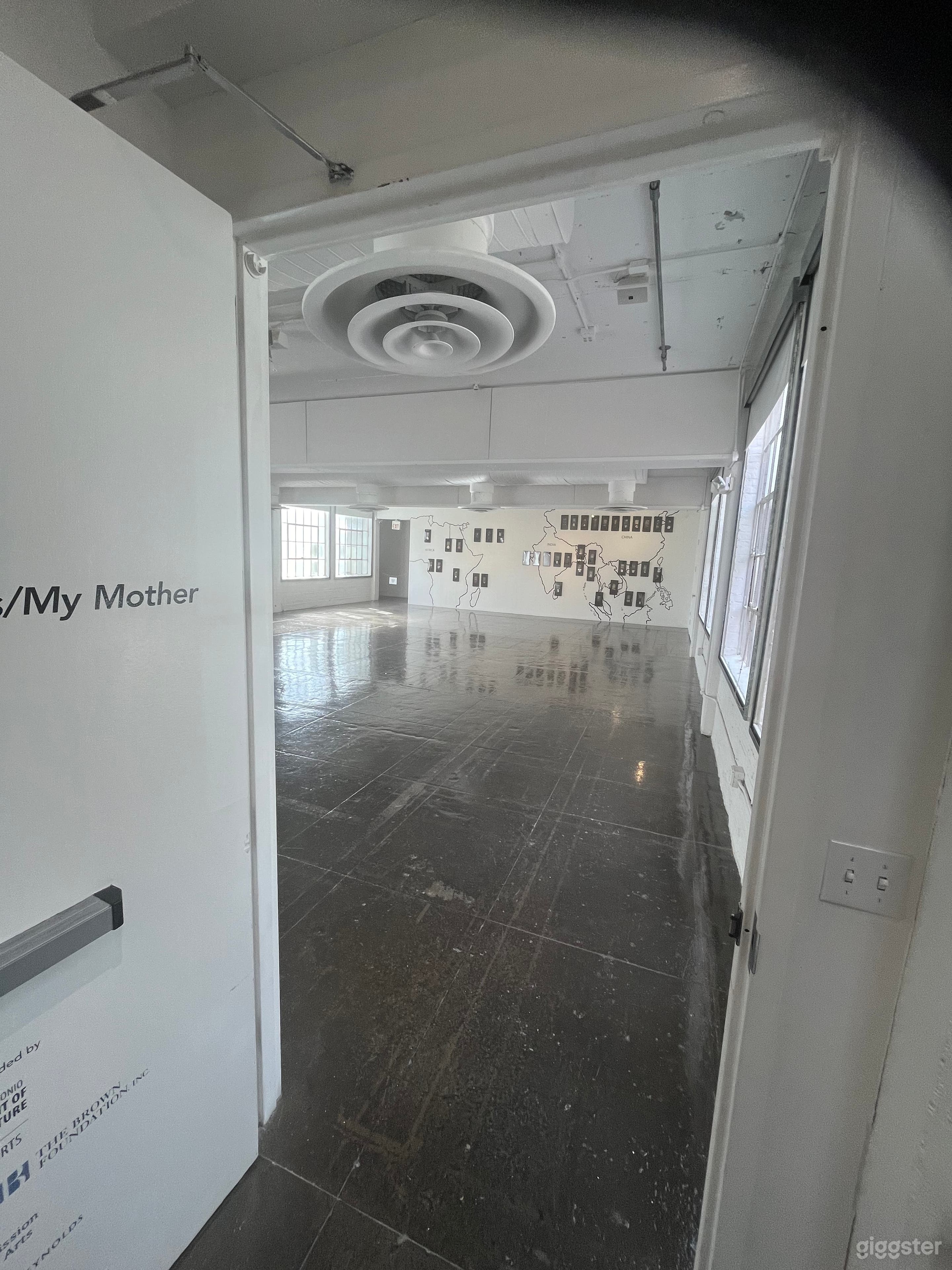 Entrance to 2,400 sq ft event space. Chairs, table, audio system, and video projectors available for additional fee