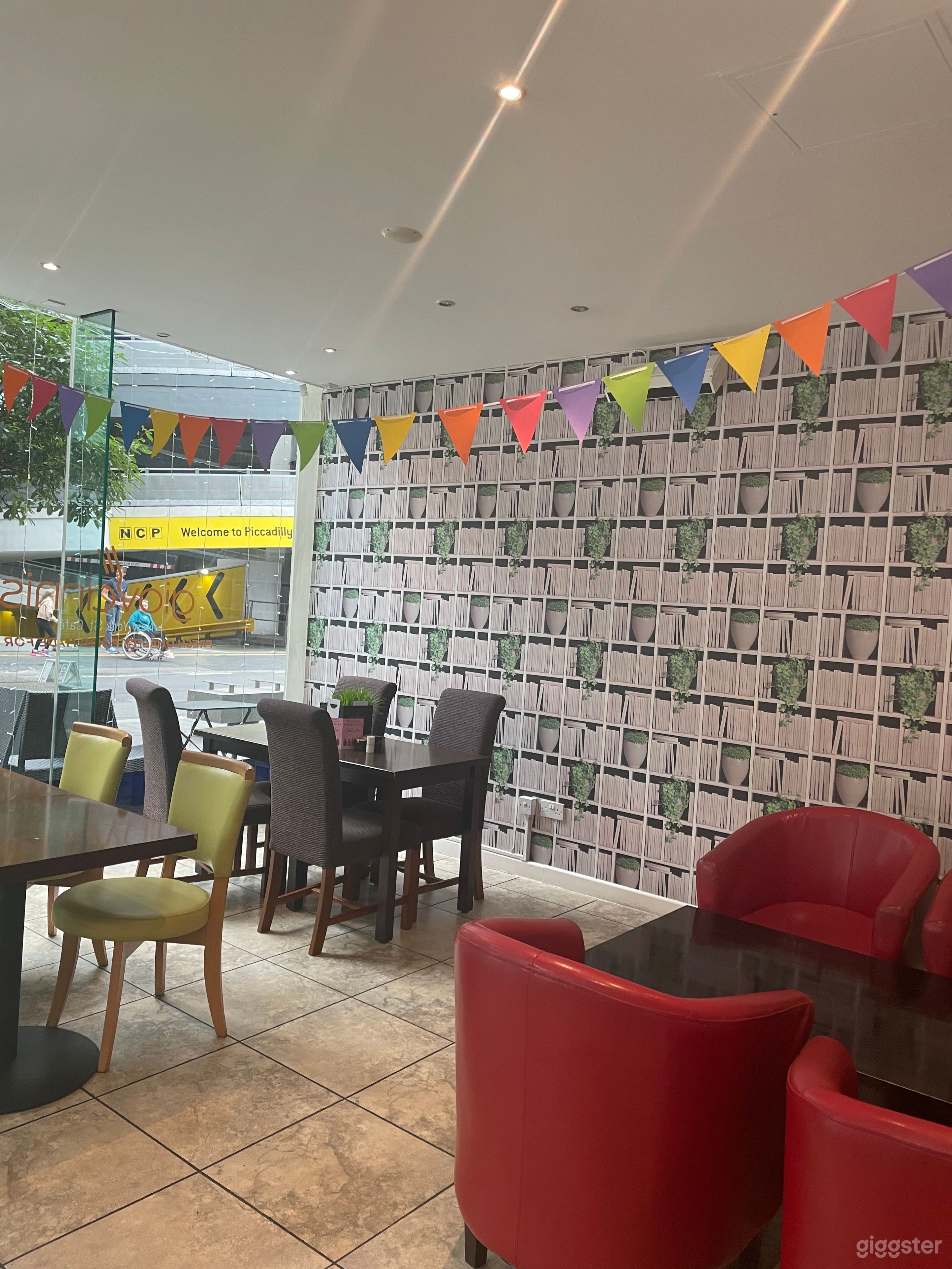 Modern Cafe with Floor to Ceiling Glass Window Photo 4