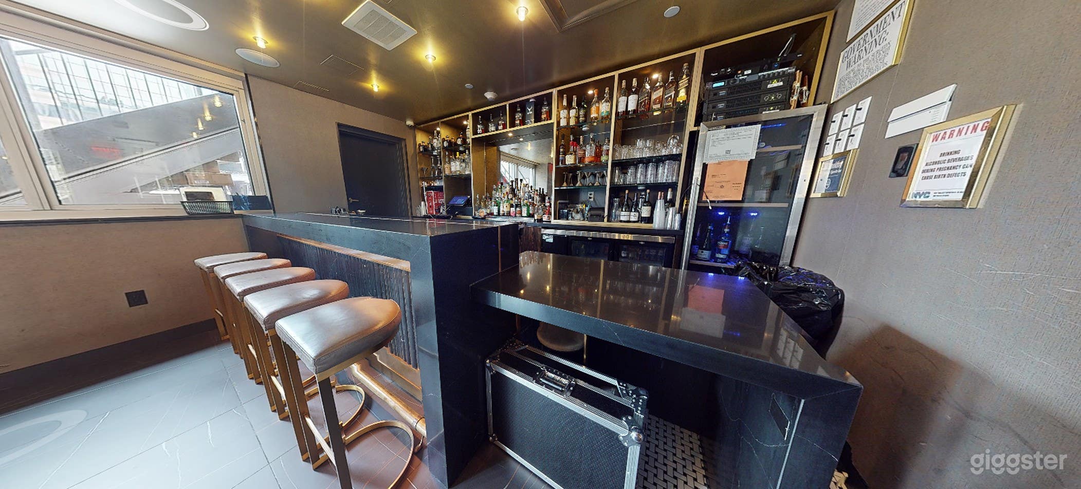 Indoor 25th Floor Venue with Stunning Water View Bar Photo 3