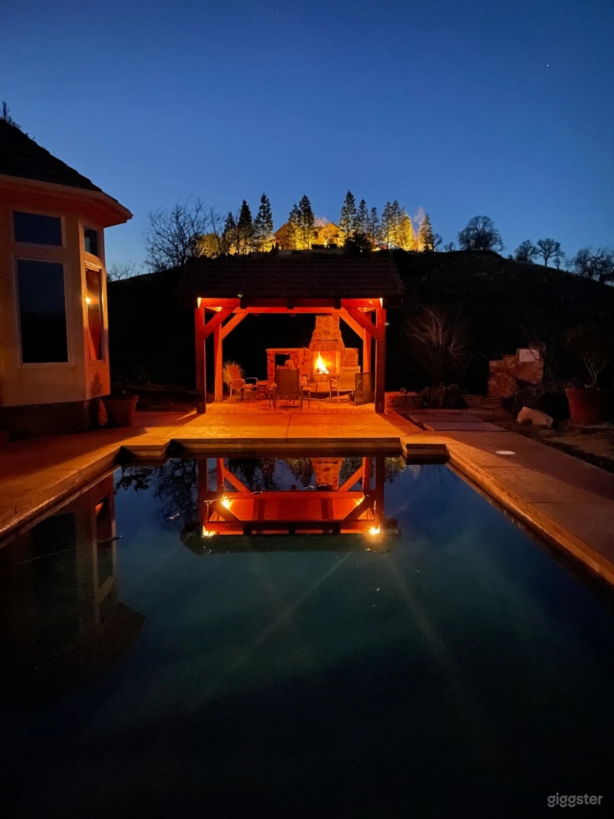 Nighttime view of pool and gazebo