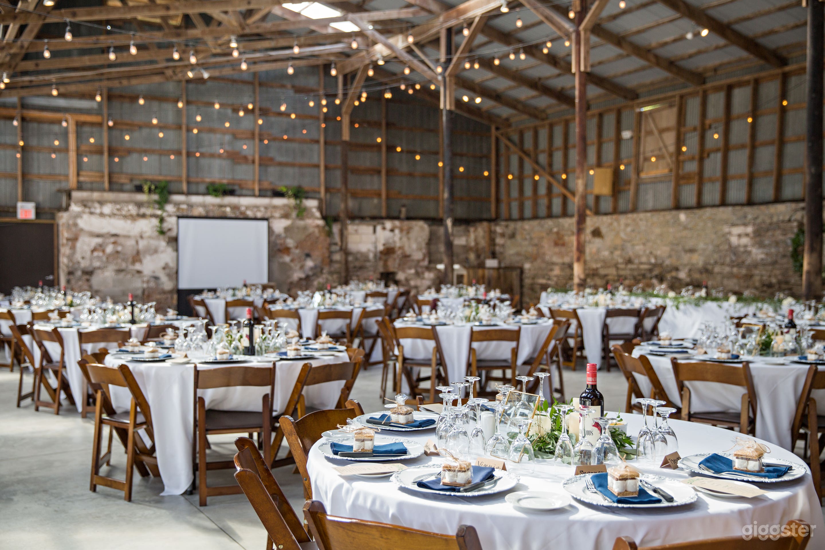 Edison lights, stone walls and barn beams