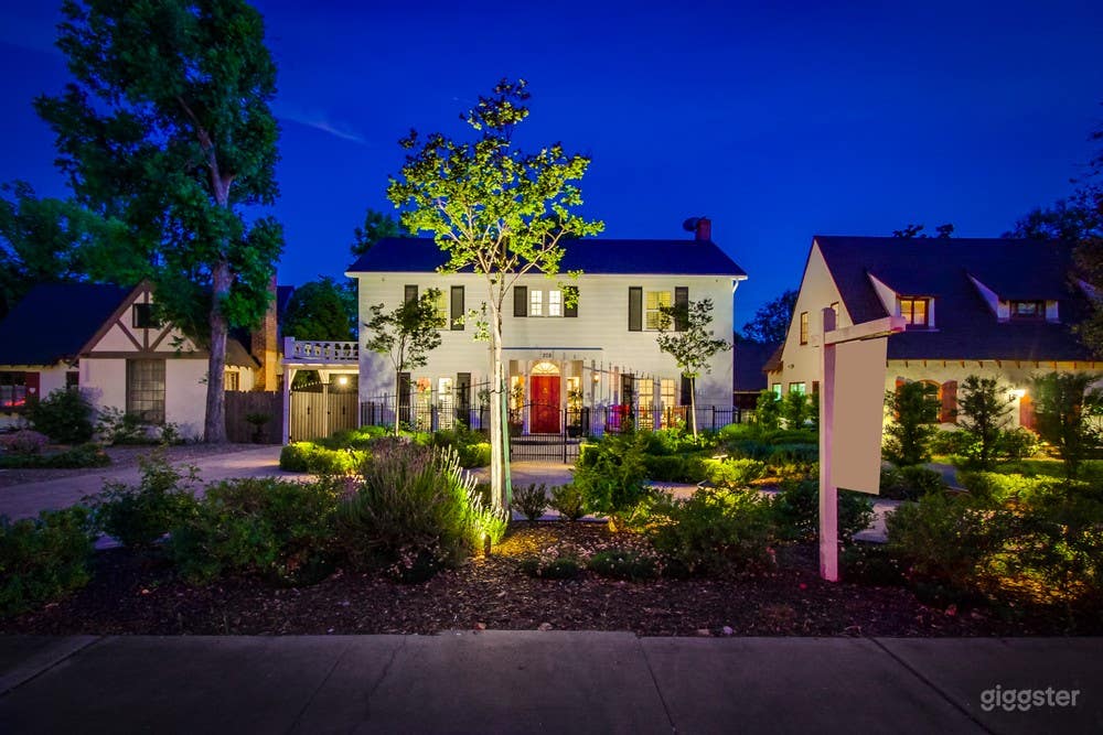 View from sidewalk, french doors open into dining room and living room