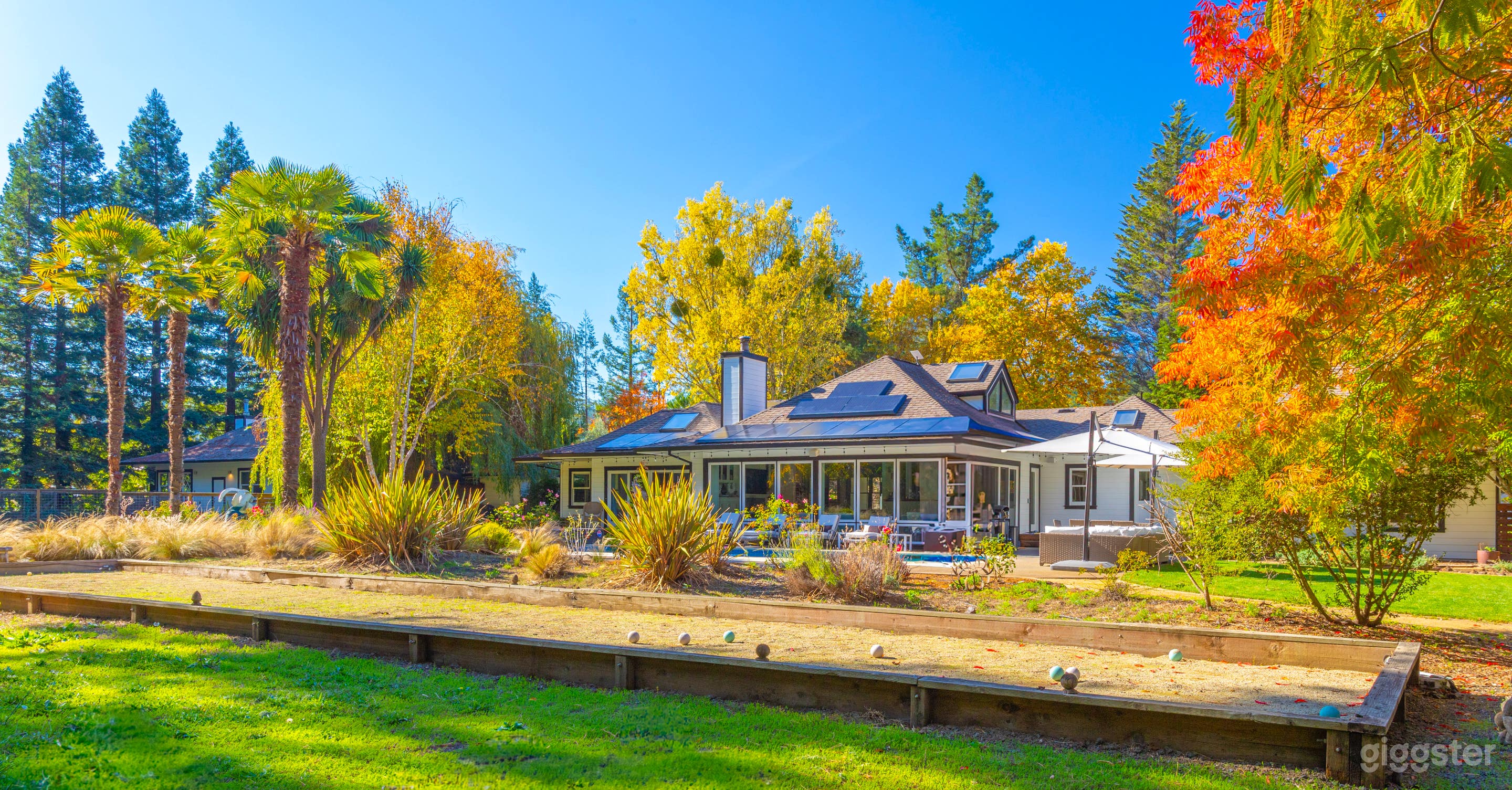 In addition to the heated pool the rear of the property boasts a Bocce Court, 8-person Dimension Hot Tub and private access to Purrington Creek.