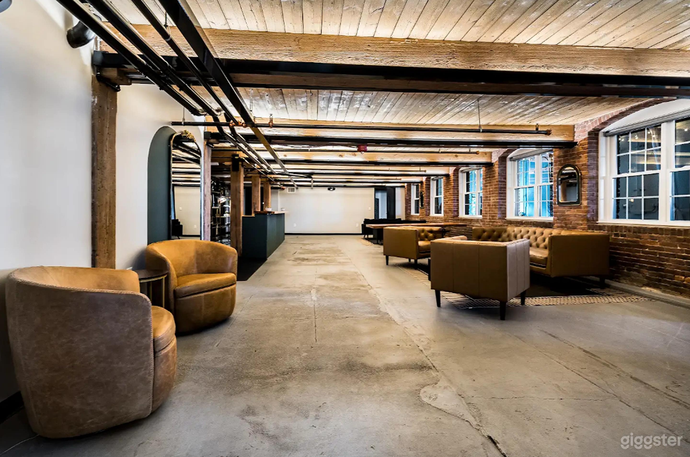 Urban-Industrial Lounge with Historic Charm Photo 1