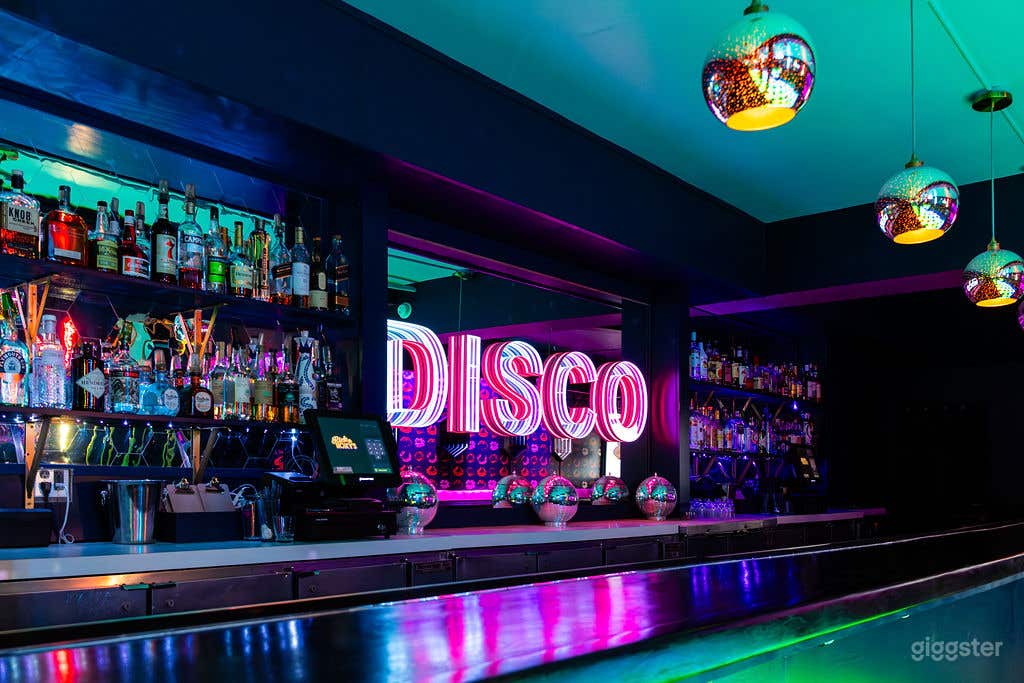 A Dual-Concept 1970s-Inspired Bar/ Nightclub Photo 2