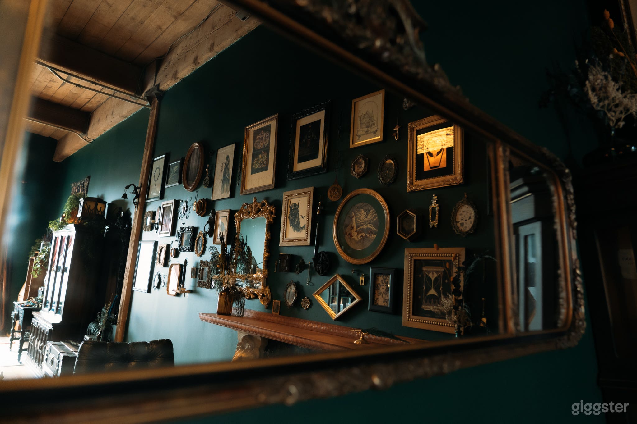Mirrored shot of the gallery wall in the first half of the space.