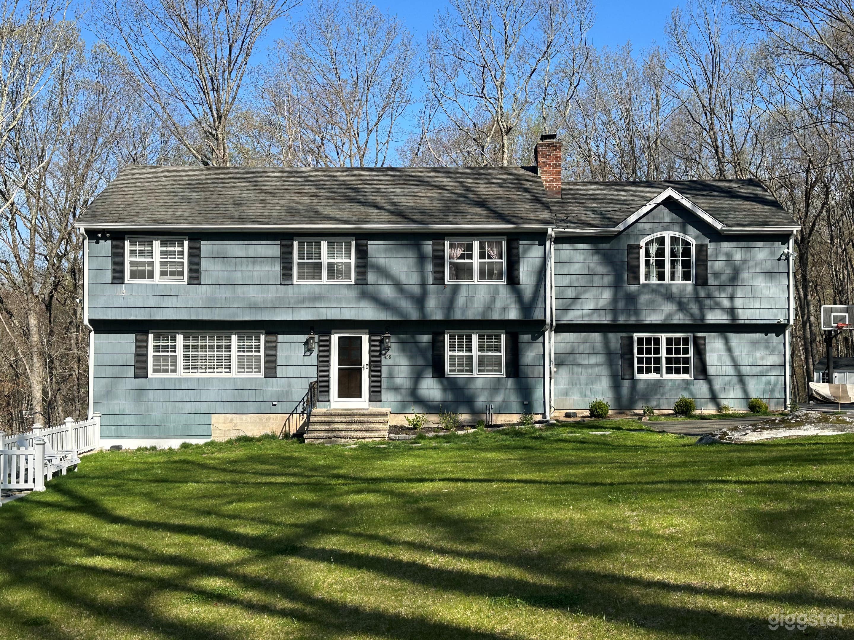 Private Home Surrounded by Trees Photo 1