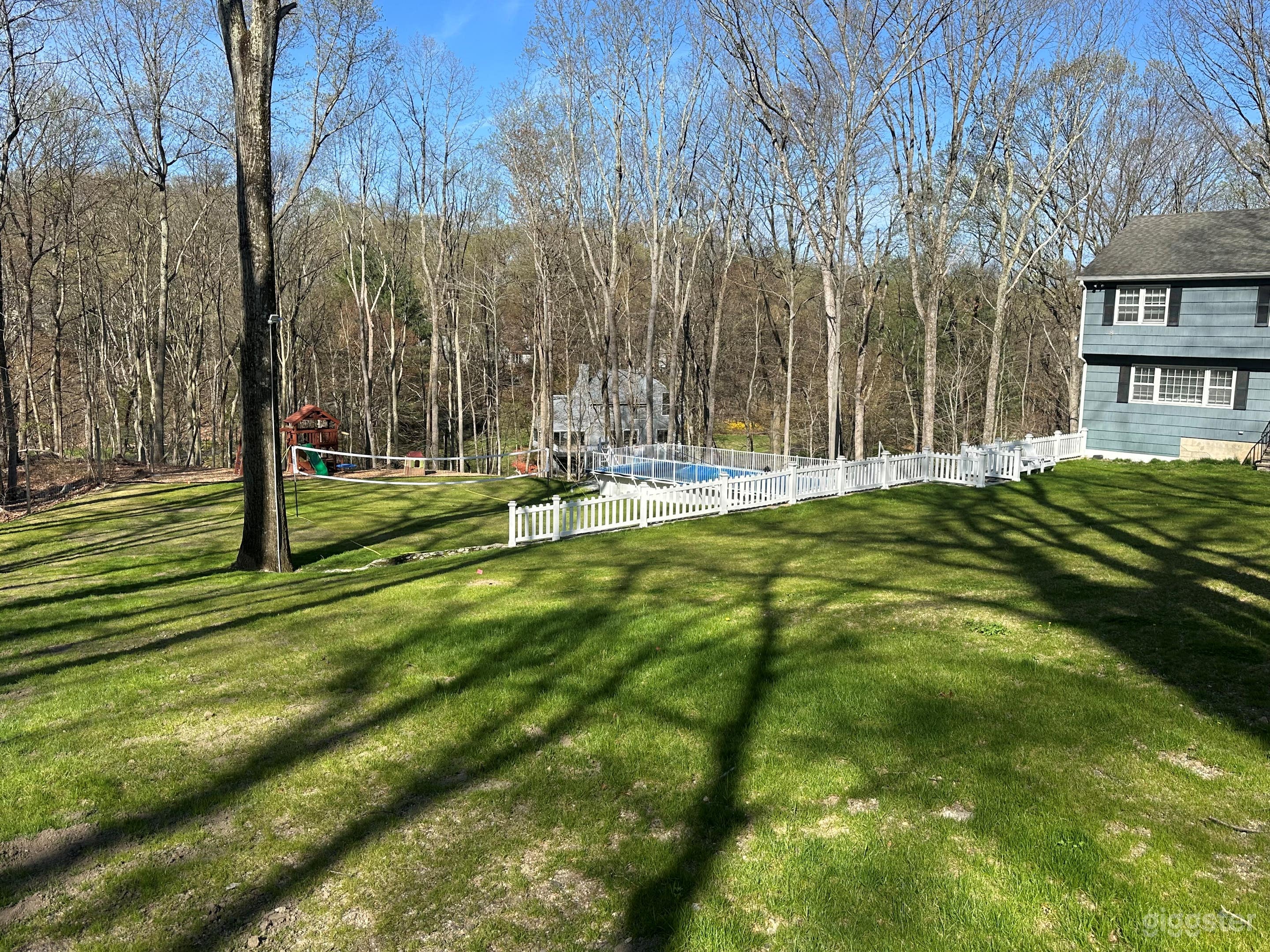 Private Home Surrounded by Trees Photo 3