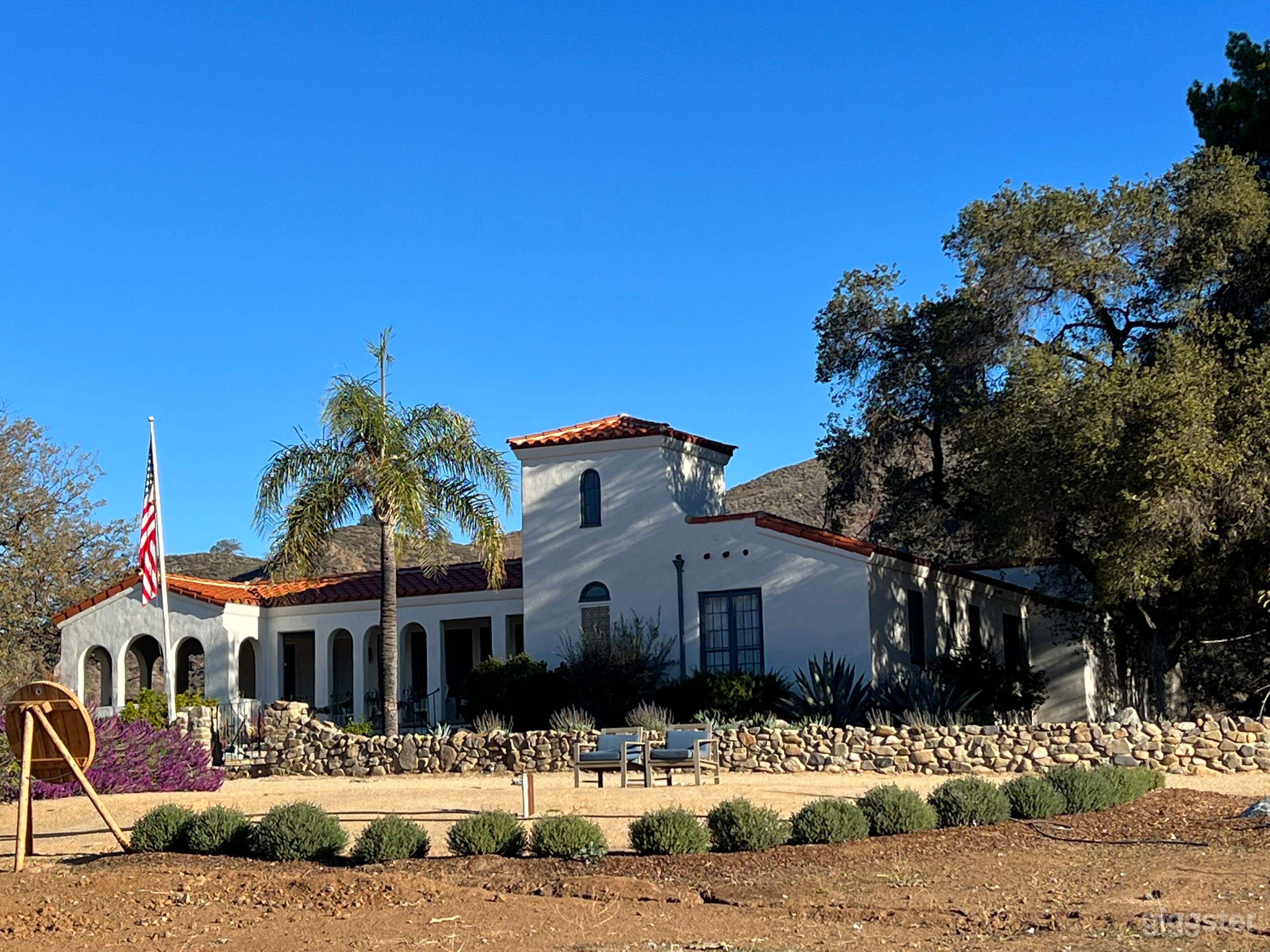 back of house with dg and seating area