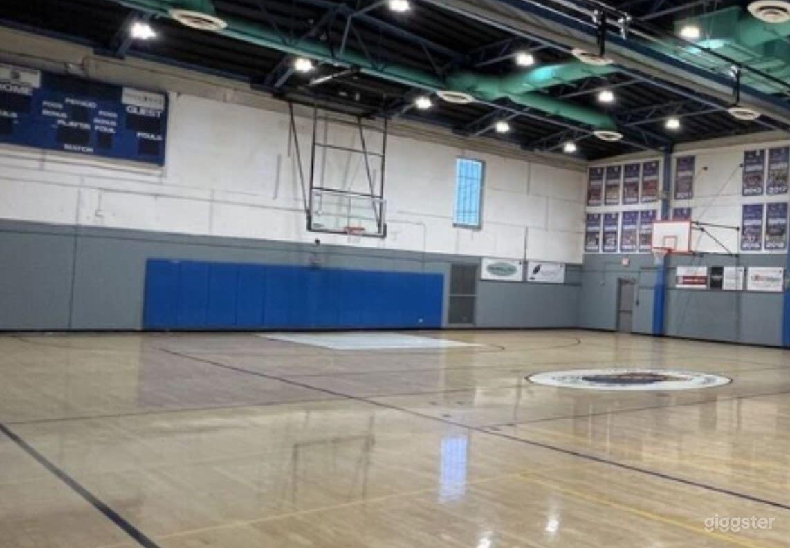Spacious Indoor School Basketball Court Photo 3