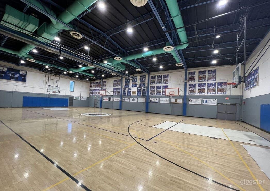 Spacious Indoor School Basketball Court Photo 2