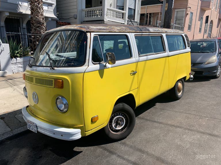  Our yellow and white 1979 Volkswagen transporter with 7 seats. 