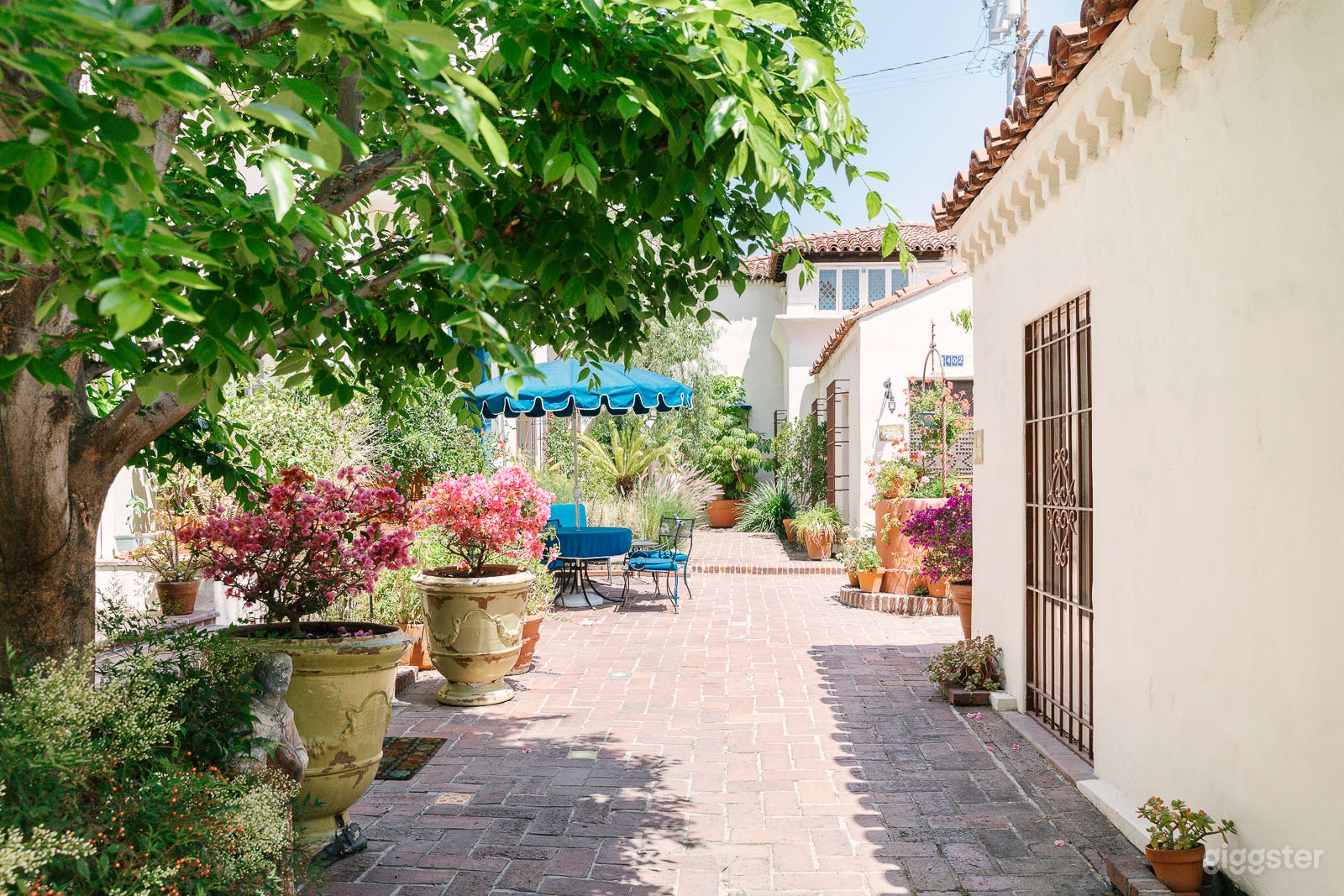 Area leading up to studio which is on right. You would have permission to shoot in both areas; left and right.