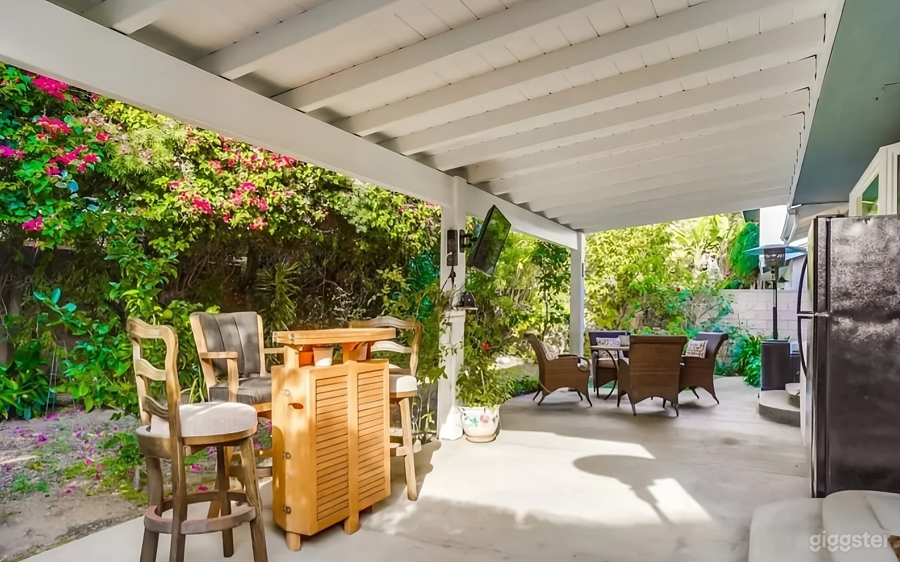 Bougainvillea Adorned Backyard Patio Photo 1