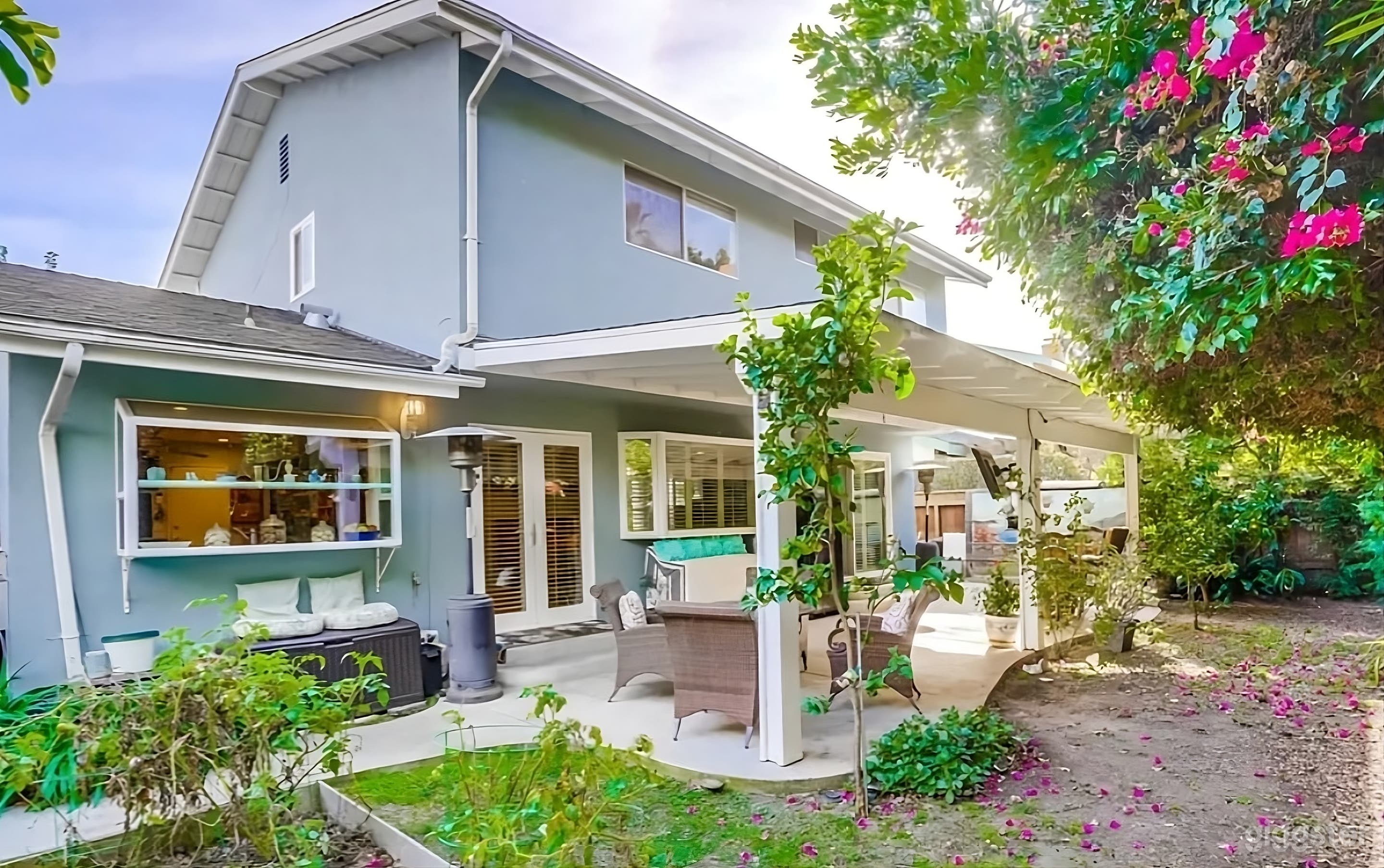 Bougainvillea Adorned Backyard Patio Photo 4