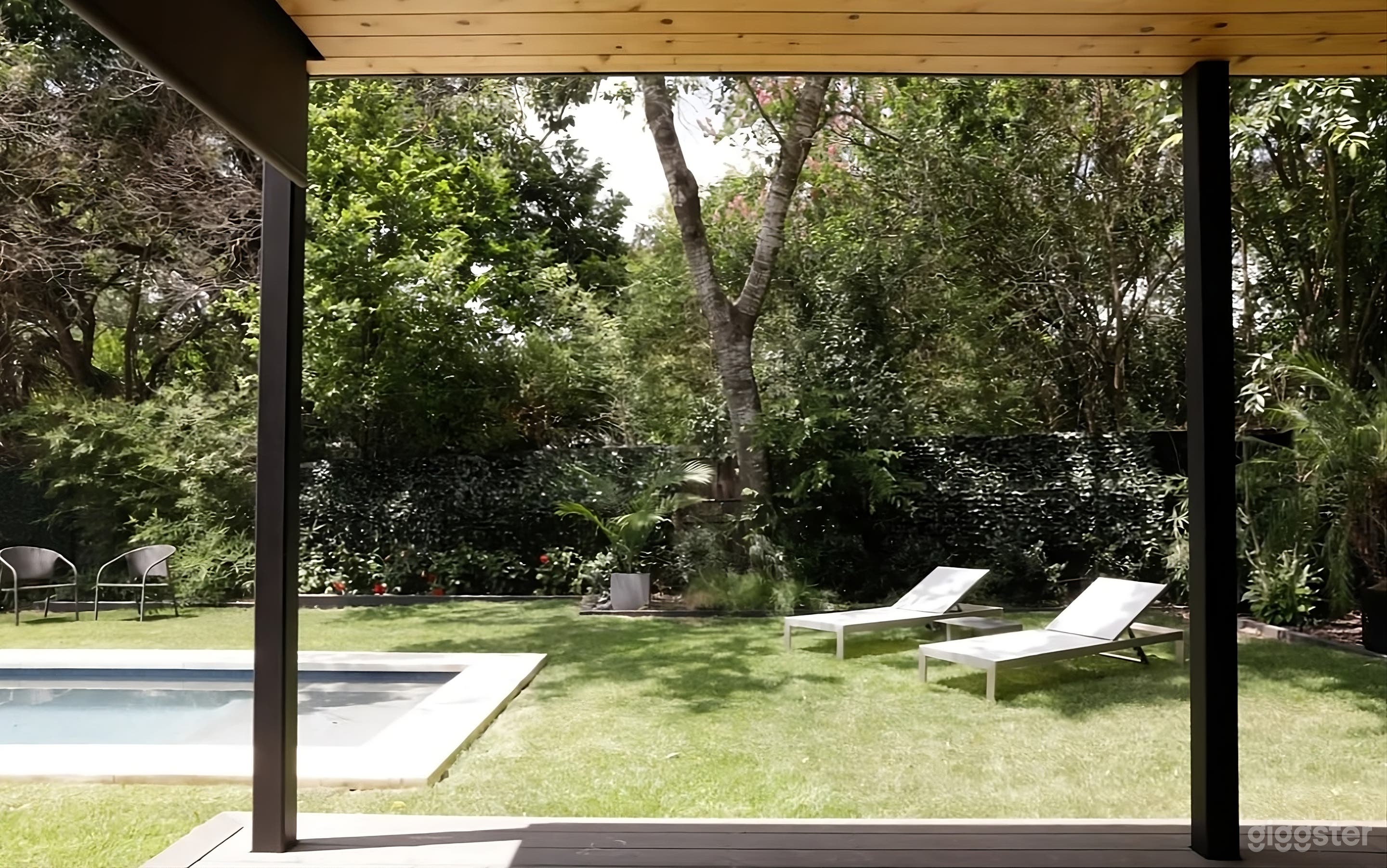 Backyard with Pool and Alfresco Living Space Photo 1