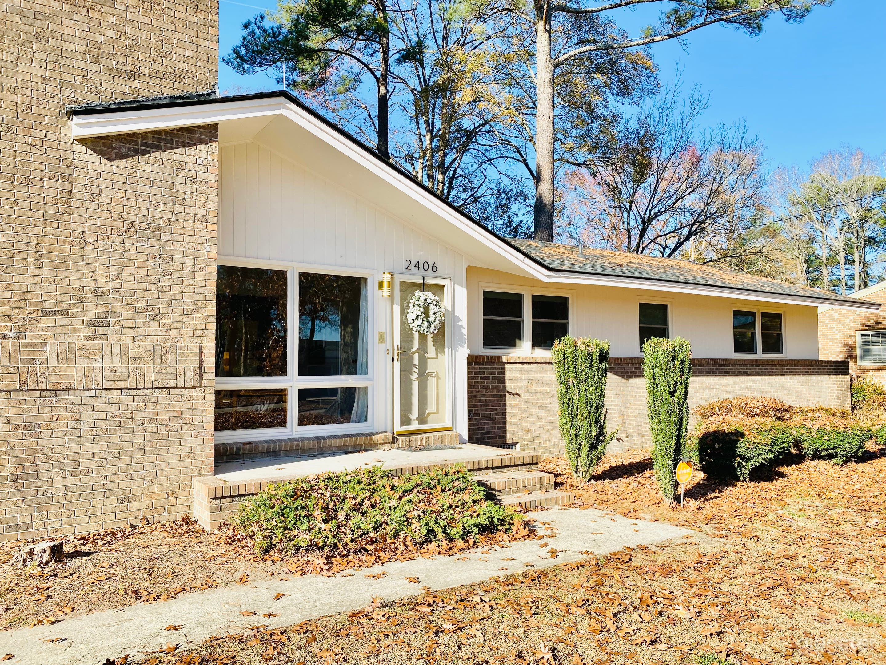 Exterior front porch with ample front yard