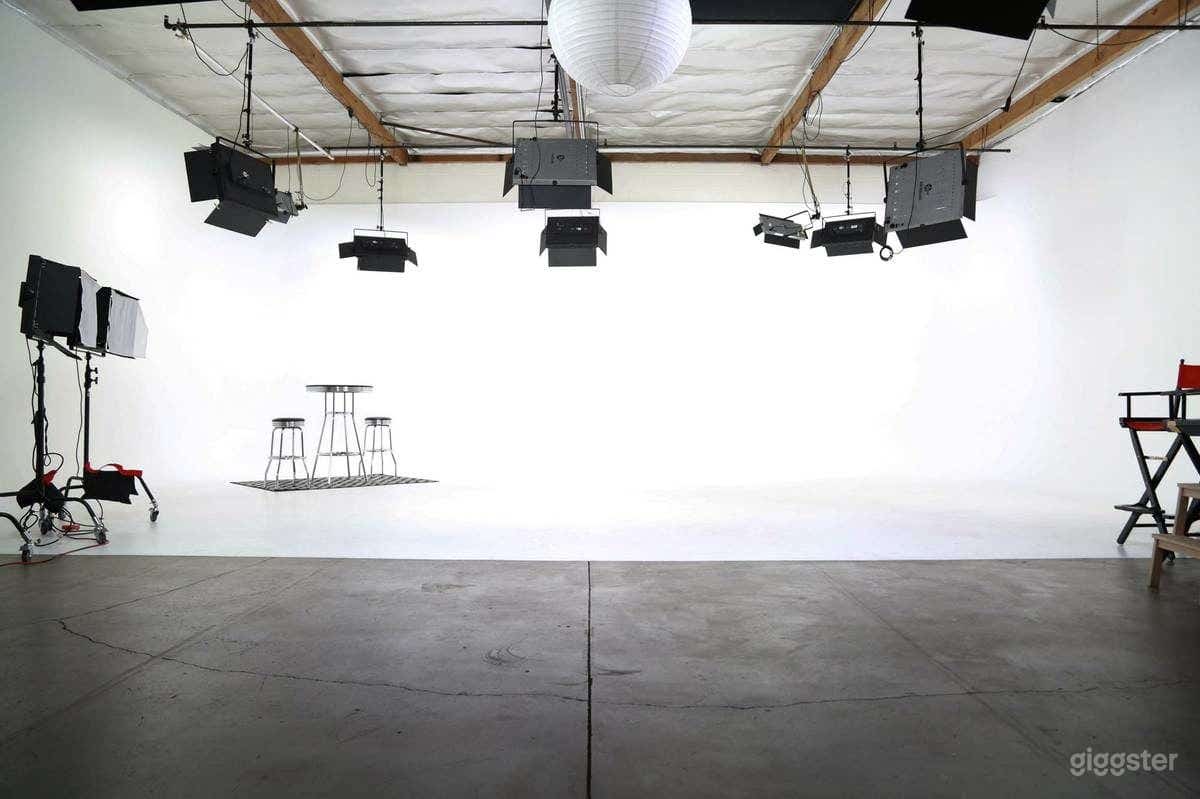 Amazing Fully Lit White Cyc Studio Photo 2