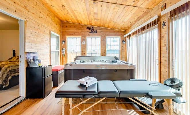 Hot Tub with a Sunroom Photo 1