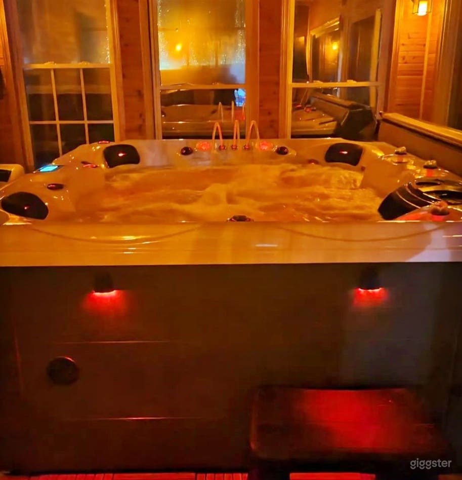 Hot Tub with a Sunroom Photo 3