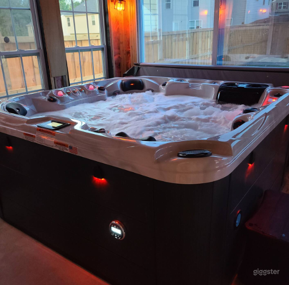 Hot Tub with a Sunroom Photo 2