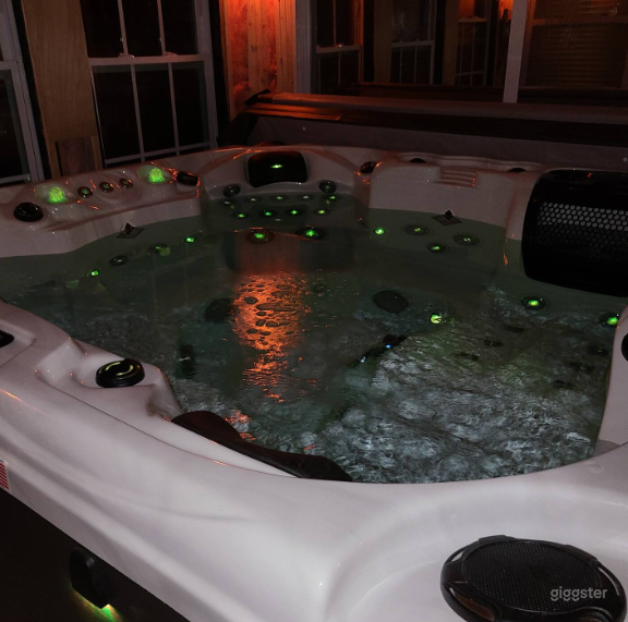 Hot Tub with a Sunroom Photo 4