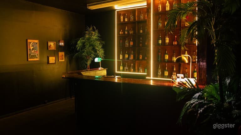  Bar set, LED lights, liquor bottles decor, red bar stools, stage, accent lounge chairs. 