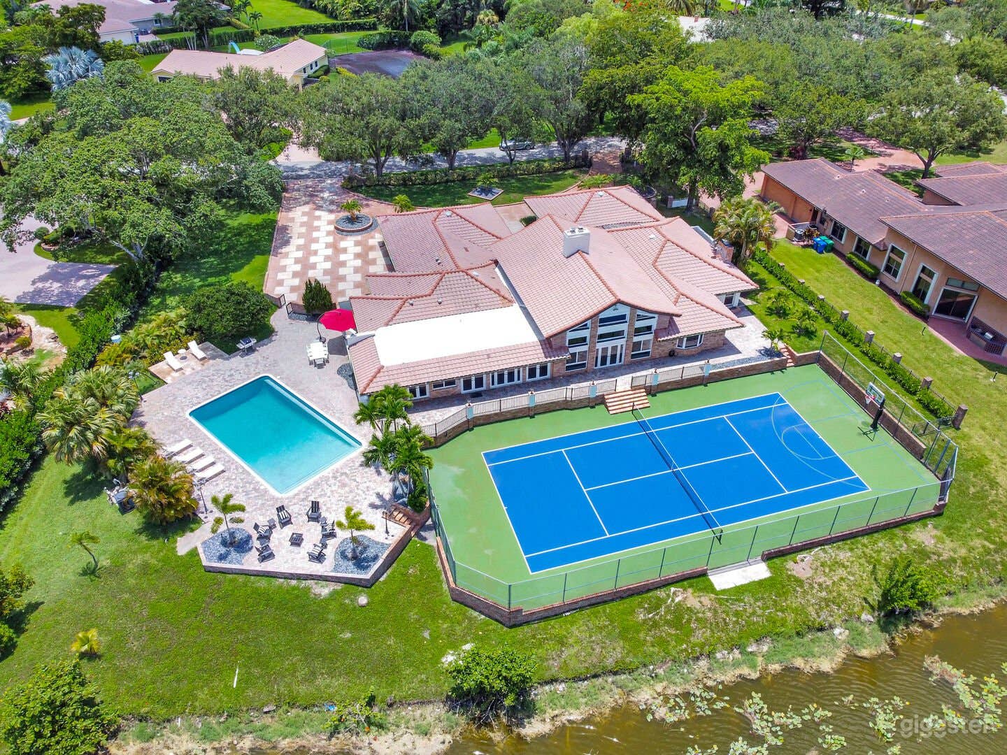 #4205 A Tranquil waterfront estate with Pool Tennis Pickleball and basketball  court Photo 1