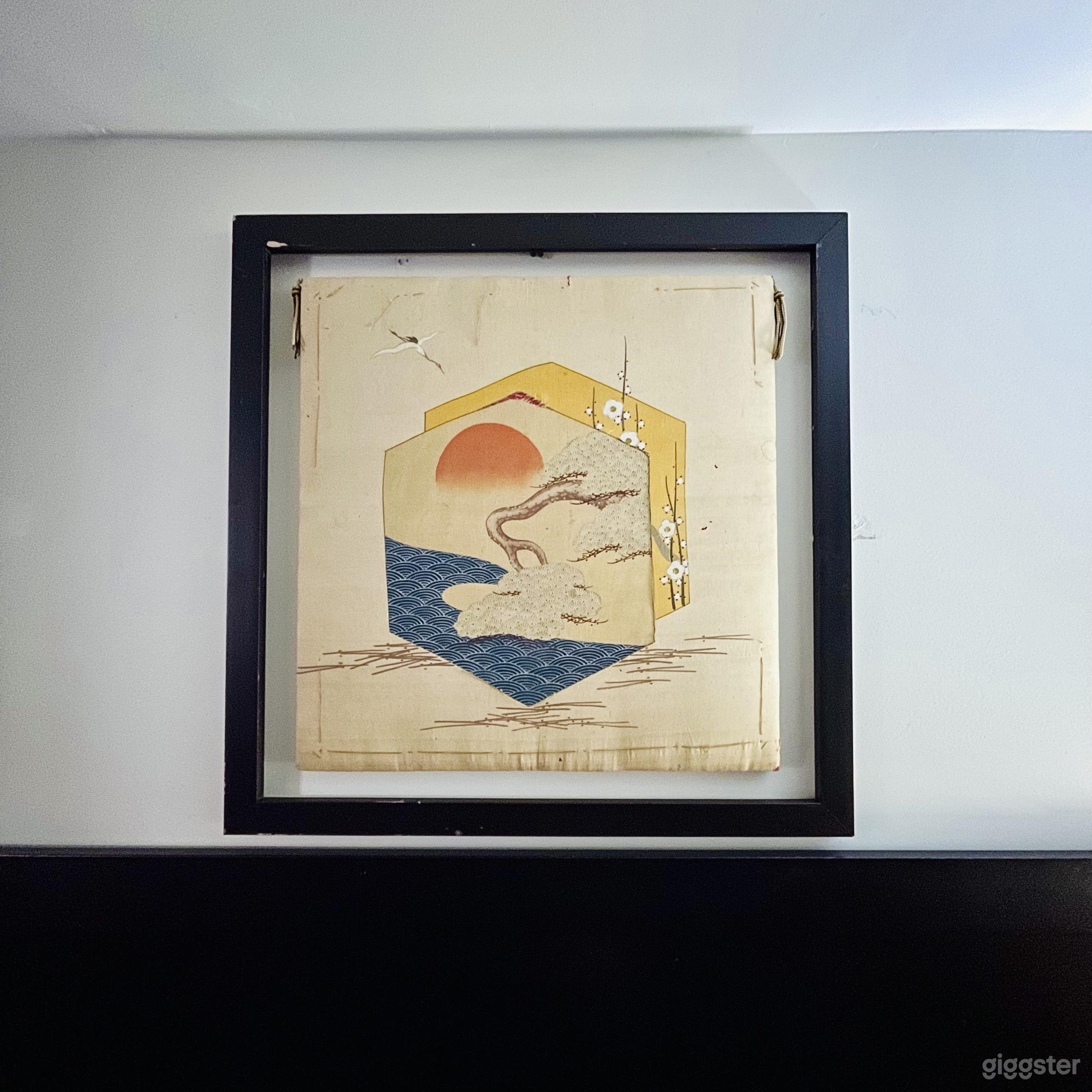 Japanese art accent piece above downstairs bed. Very old!