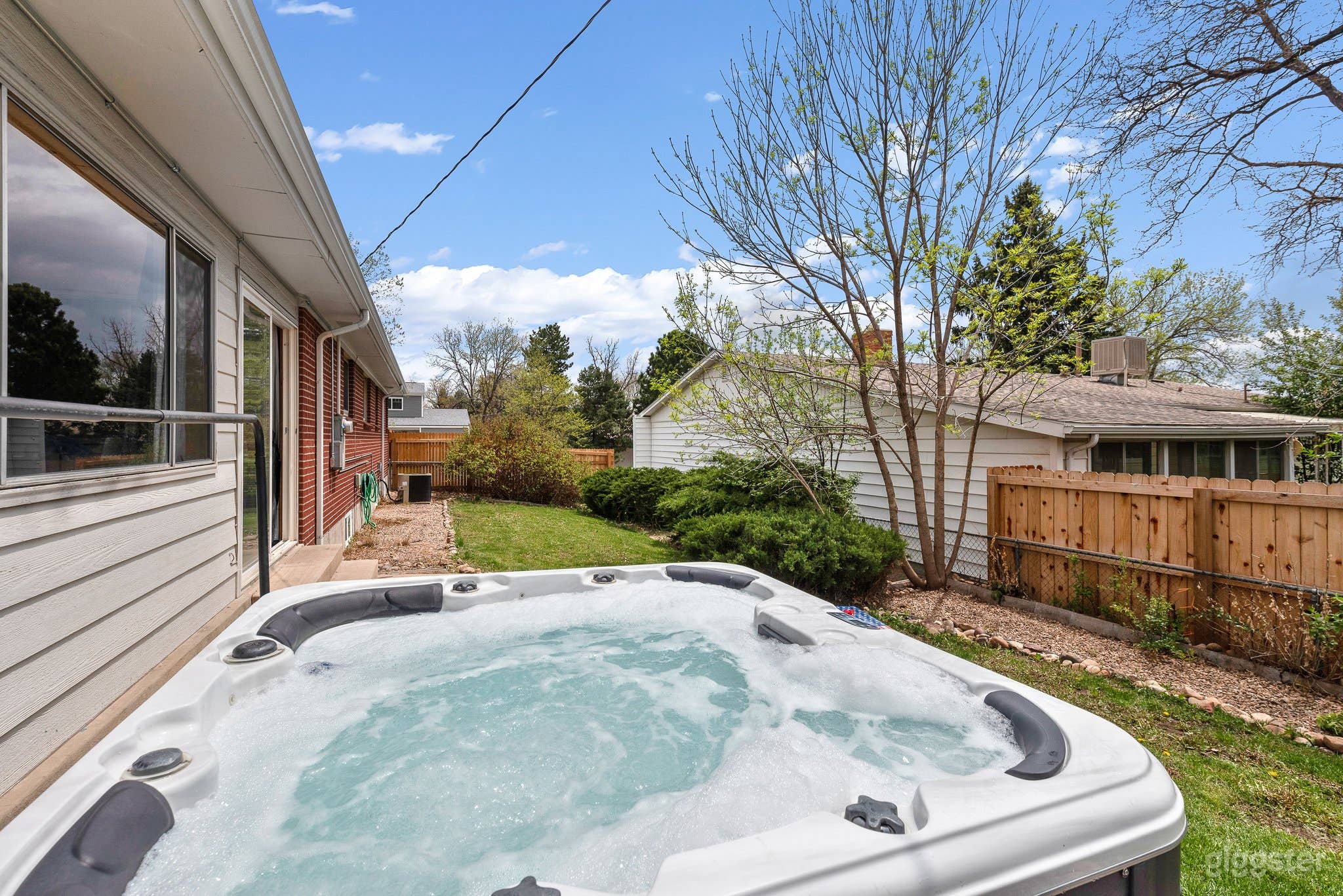 Step into relaxation with a hot tub in your backyard