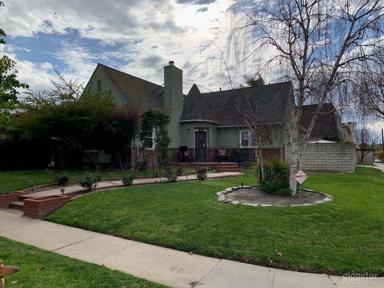 Storybook corner exterior with curving path