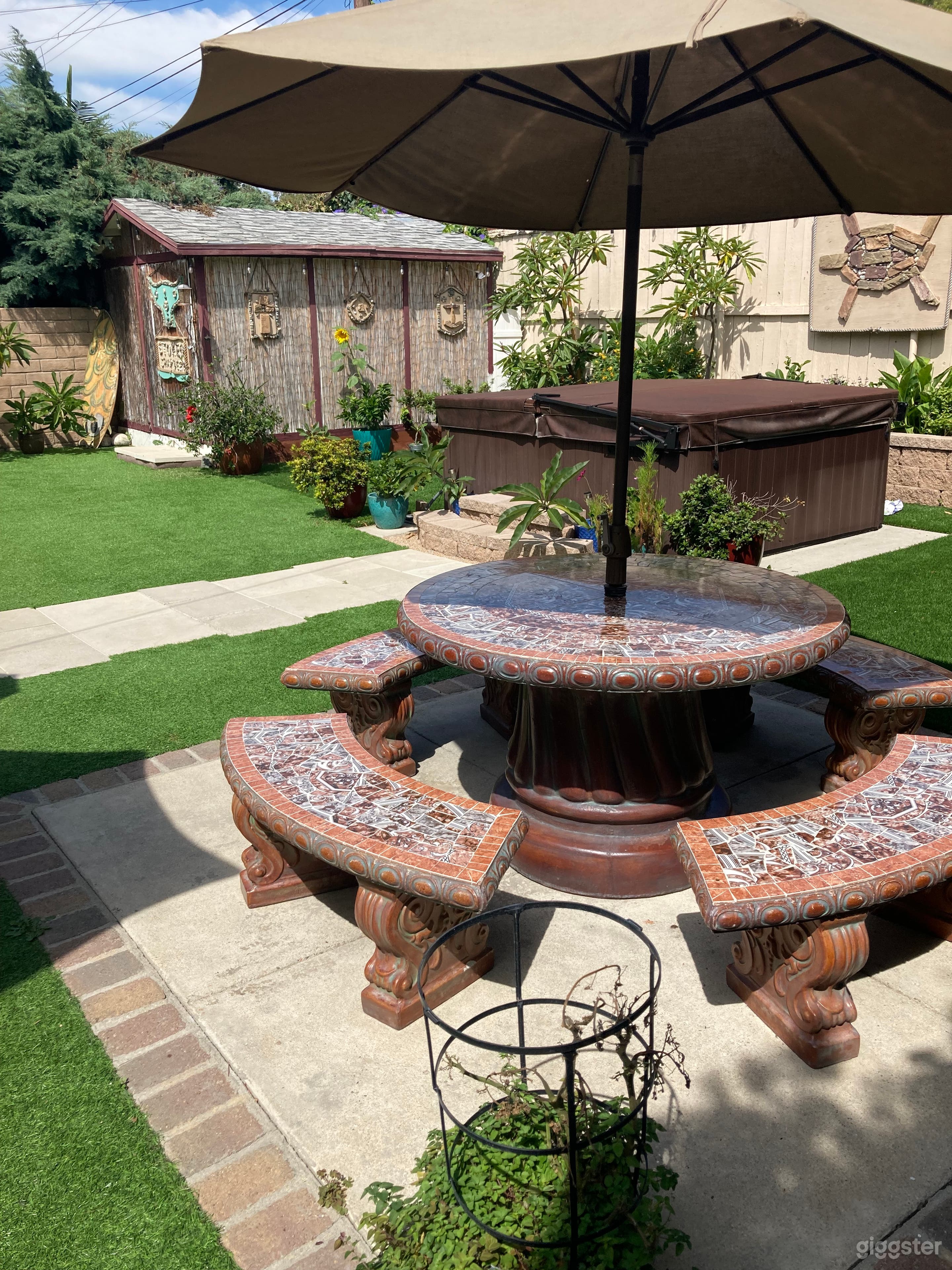 Tiled table and benches on lower patio 