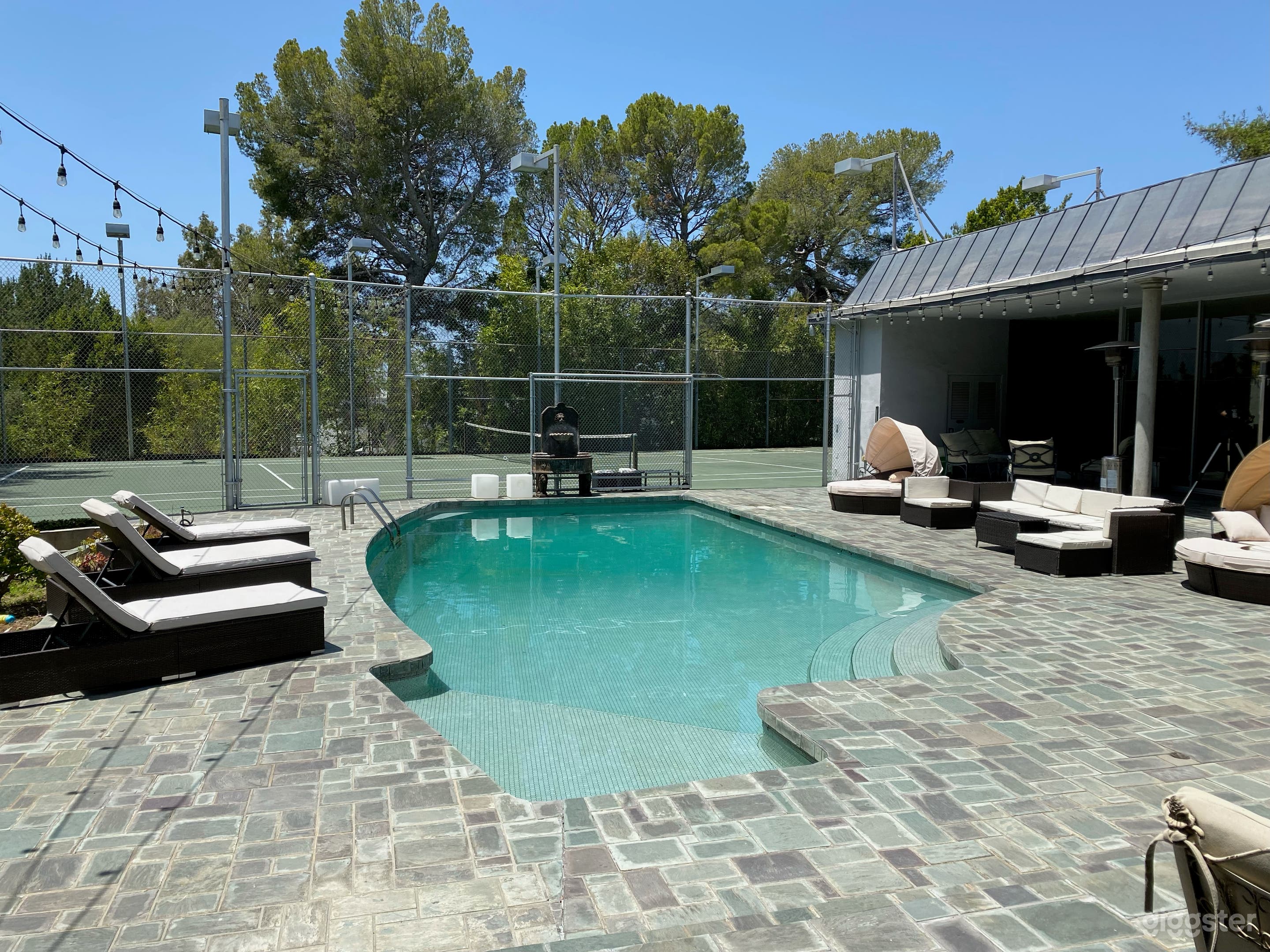 Mid Century Modern home with tennis court and pool Photo 1