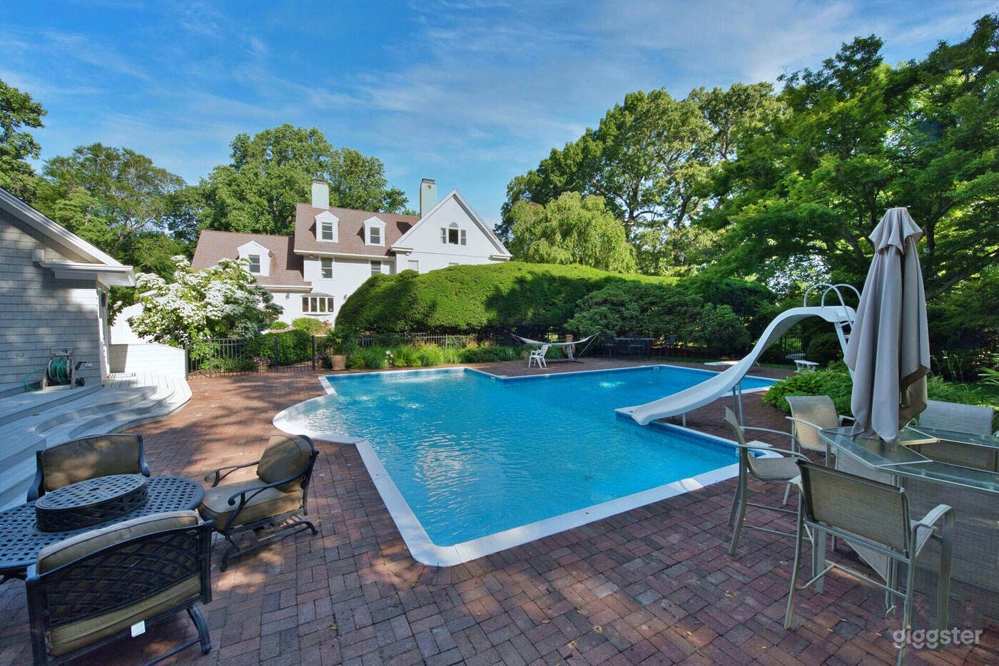 brick patio, slide and diving board