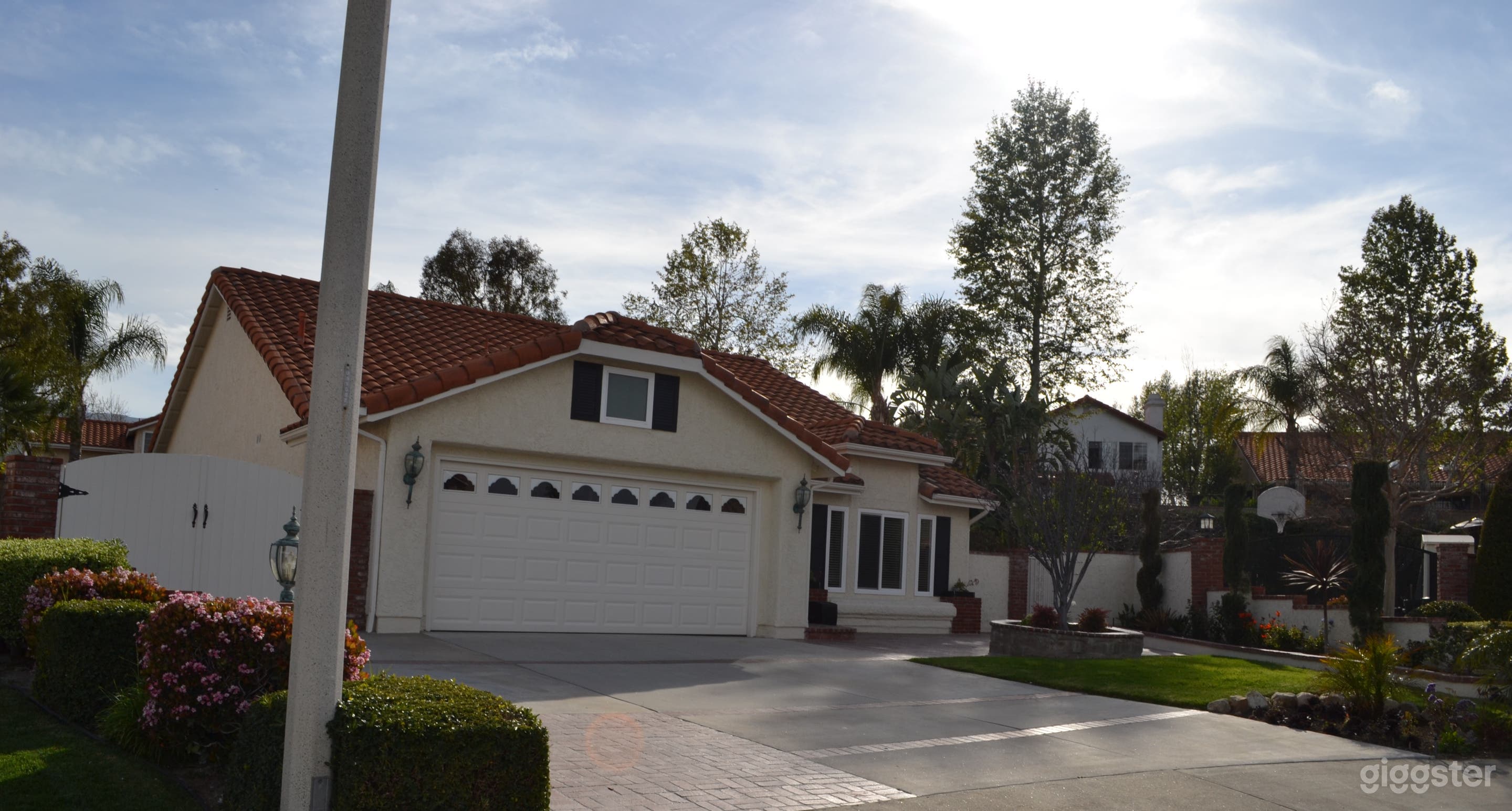 Two car garage, three parking spaces out front.