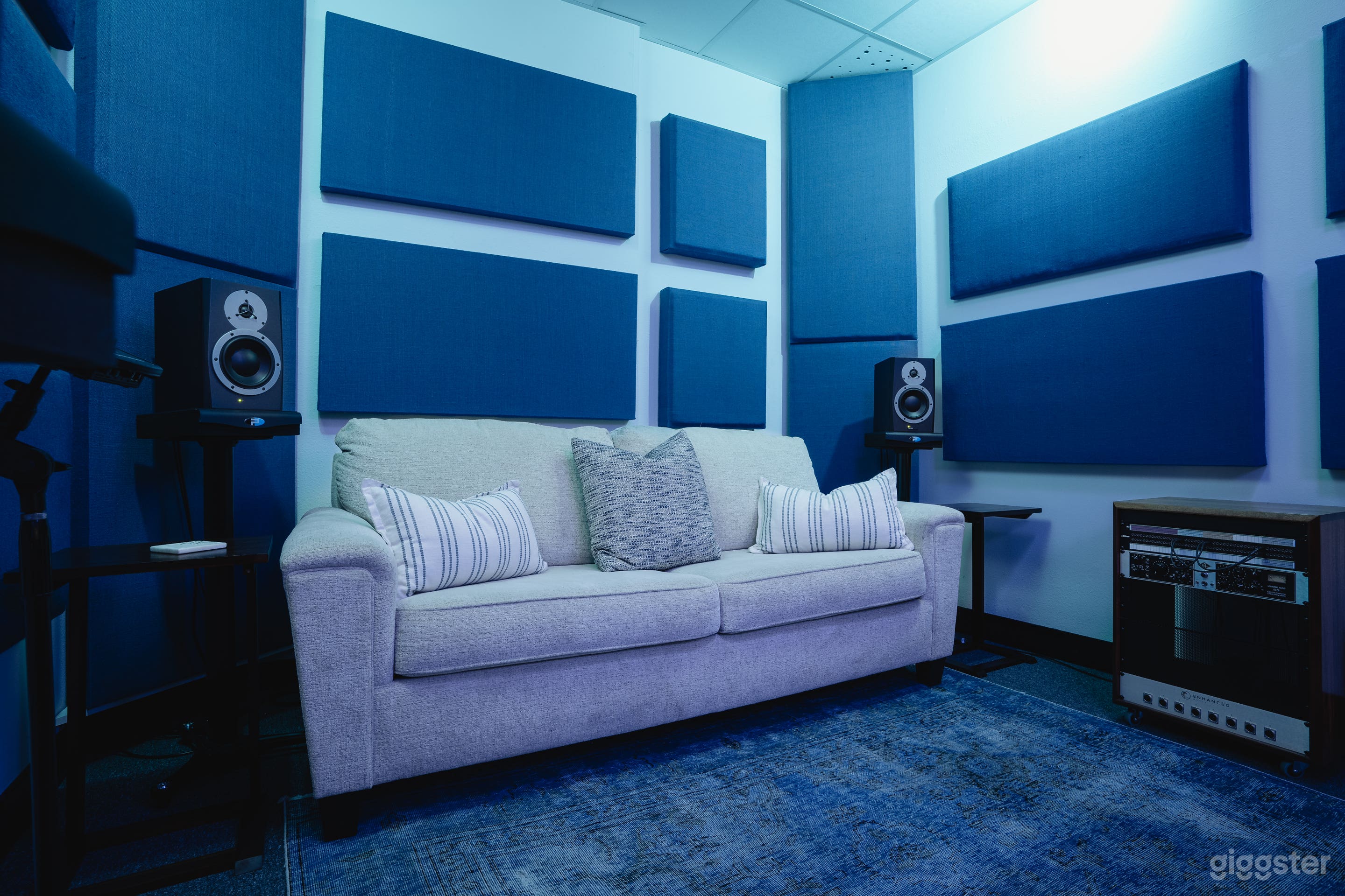 Comfortable seating is located in the back of the studio as well as in front of the mixer with the best possible listening position for clients. 